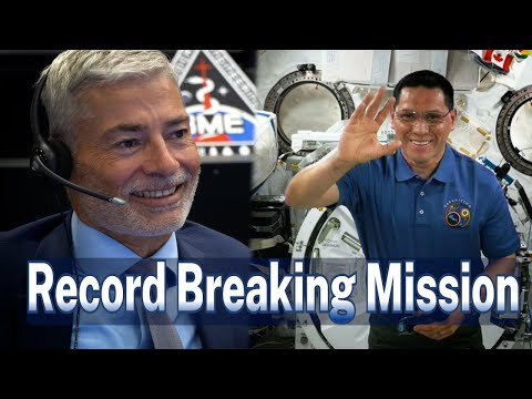 SPACE STATION ASTRONAUT DISCUSSES RECORD BREAKING MISSION WITH PREVIOUS RECORD HOLDER