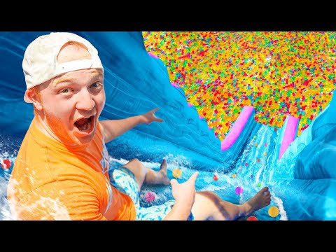 BIGGEST Backyard Water Slide With 100 MILLION ORBEEZ!